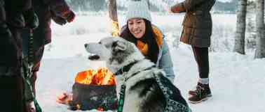 Gather-around-the-fire-on-a-dogsled-tour-at-Spray-Lakes